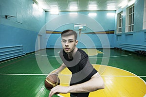 Basketball player in action in a basketball court