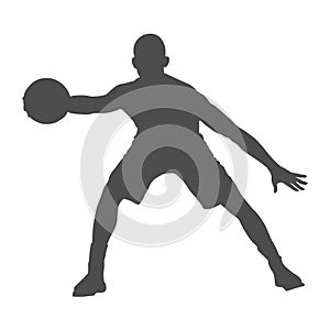 Basketball player with a ball. Silhouette of an athlete with a ball