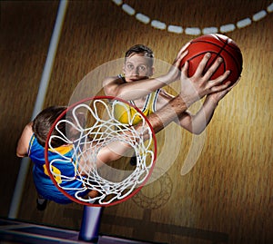 Basketball player is blocking shot during the match