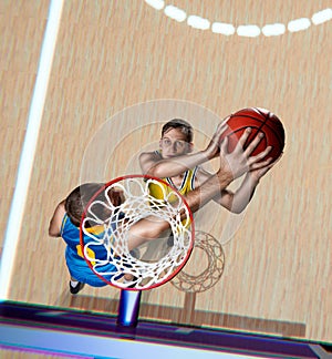 Basketball player is blocking shot during the match