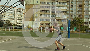 Basketball player dribbling the ball between legs