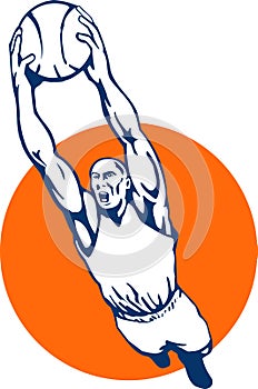 Basketball player dunking ball