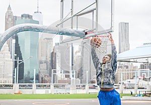 Basketball player making a slam dunk