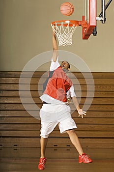 Basketball Player Misses Slam Dunk