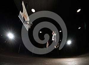 Basketball player at night
