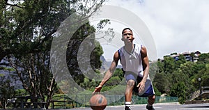 Basketball player practicing dribbling