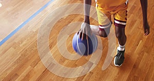 Basketball player practicing dribbling drill
