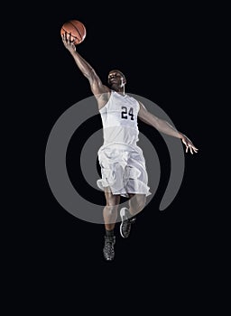 Basketball Player scoring a basket