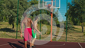 Basketball players making handshake after match