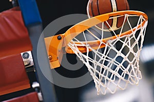 Basketball scoring basket at a sports arena. Scoring the winning points