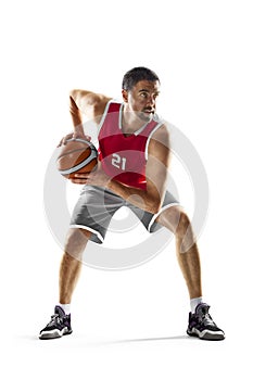 Basketball sport. Professional basketball player preparing to attack. On a white background