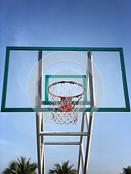 Basketball street court on blue sky background