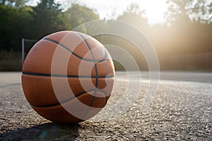 Basketball on sunny outdoor court, ready for game action