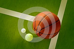 A basketball, a tennis ball and a Ping-Pong ball
