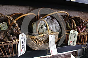 Baskets of charcuterie in a French shop