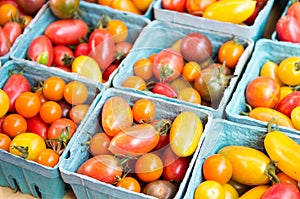 Baskets of colorful cherry tomatoes