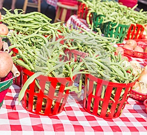 Baskets of Fresh Busch Snap Beans at a Local Farmers Market