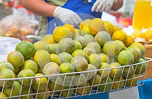 Baskets full of beautiful oranges for sale at the farmer's marke