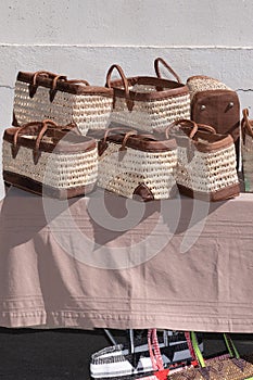 Baskets handicraft wicker commercialized bags on street market for sale