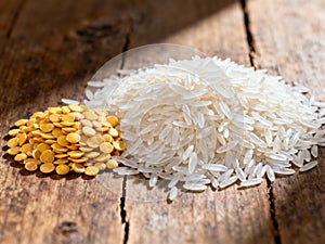 Basmati Rice and Split Red Lentils (Masoor Dal) on a Rustic Wooden Table AI-GENERATED