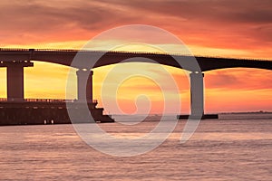 Basnight Bridge Silhouette Against Fiery Sunset