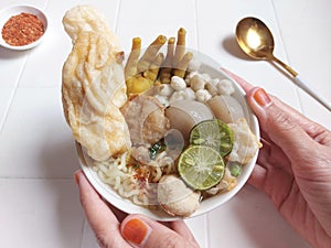 Baso aci. It is popular food from Indonesia. Similiar with meat ball but it made from tapioca flour.