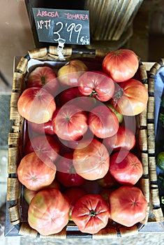 A basquet of Pink Tomatoes photo