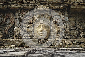 Basrelief carving of Mayan king at the palace of the archaeological site of Palenque, Chiapas, Mexico