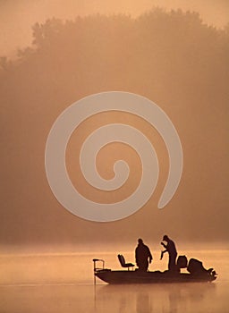 Bass Fishermen Admiring Their Catch photo