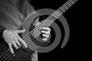 Bass-guitar in male hands