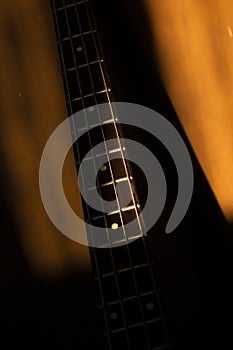 Bass guitar in music studio shot at golden hour