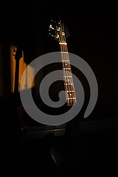 Bass guitar in music studio shot at golden hour