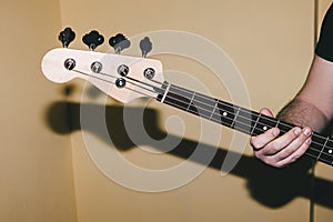 Bass guitar riff closeup. Music background