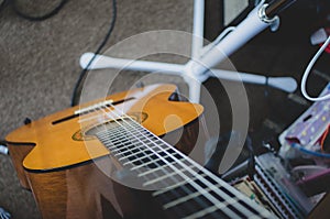 Bass guitar on stand - top down view.