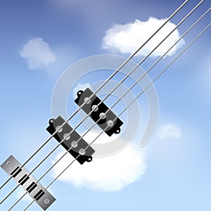 Bass guitar strings over sky