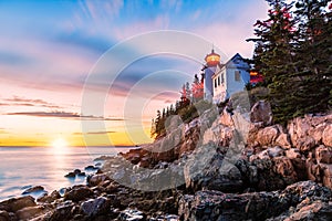 Bass Harbor Head lighthouse at sunset, in Maine