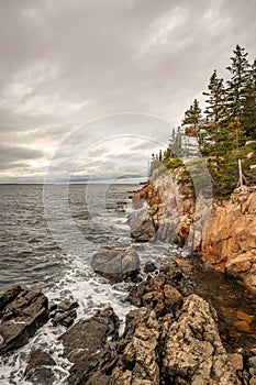 Bass Harbor Lighthouse on a Cloudy Day in Maine photo