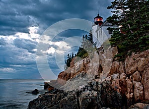 Bass Harbor Lighthouse and stormclouds at dusk