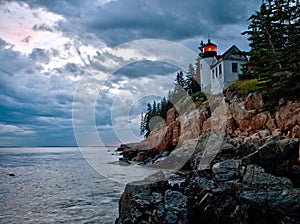 Bass Harbor Lighthouse and stormclouds at dusk