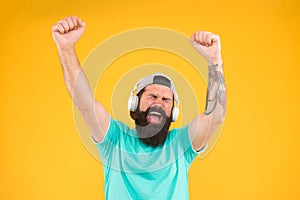 Bass low sound. Hipster headphones gadget. Inspiring song. Music library. Feel rhythm. Bearded guy enjoy music