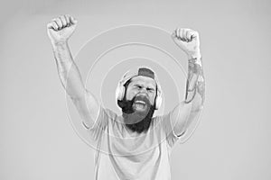 Bass low sound. Hipster headphones gadget. Inspiring song. Music library. Feel rhythm. Bearded guy enjoy music