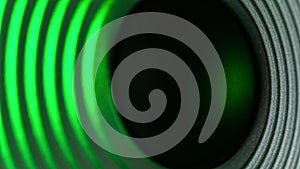 Bass Speaker Playing Music In Green Light, Close Up View