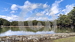 Bassa dÃÂ´Oles lake with reflection in winter photo