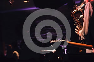 Bassist and trumpet player playing jazz music on stage