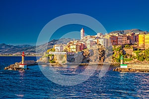 Bastia old city center, lighthouse and harbour, Corsica, France photo