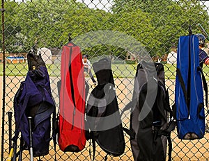 Bat bags on fence