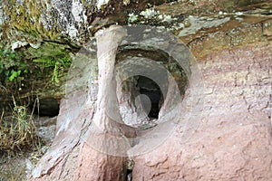 Bat cave stone with columnar formations and holes