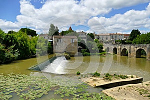 The Batan mill and the Romanesque bridge over the GÃ©lise river
