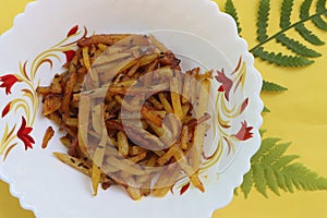 Batata salli, Potato shreds stir fry, Maharashtrian traditional food photo