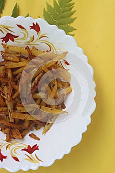 Batata salli, Potato shreds stir fry, Maharashtrian traditional food photo